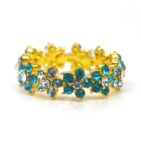 My Bead Emporium Jewelry - Ring of daisies with blue stones and center CZ.